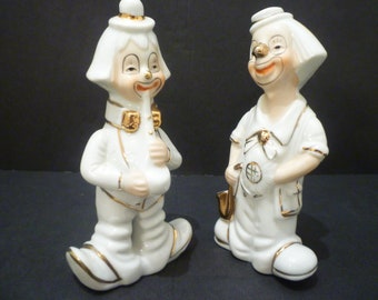 CLOWN FIGURINES. Vintage Clown Ornaments, Collectible Clown Figurines. A Set Of Two White And Gold 1960's Collectible Clown Figurines.