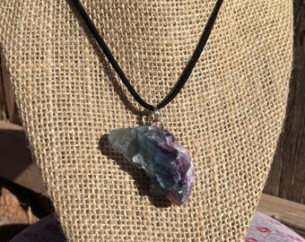 Raw fluorite on a leather cord necklace