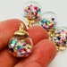 4 Glow in the Dark Glass Bottles Star Multicolor