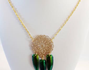 Gold necklace beetle elytra