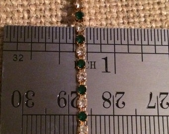 Avon simulated emerald braclet