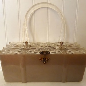 Taupey Salmon Lucite Purse with Heavily Carved Top, 3-Ball Brass Catch & Double Handle, ca 1950s