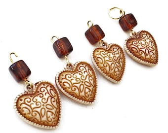 craft lot destash of salvaged rust and beige hollow acrylic heart and bead dangles--matching lot of 4