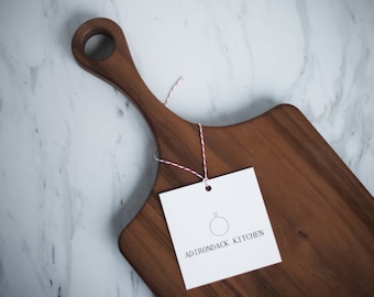 Classic Walnut Wood Cutting Board with Handle, Wood Serving Board, Paddle Board - FREE CARE KIT