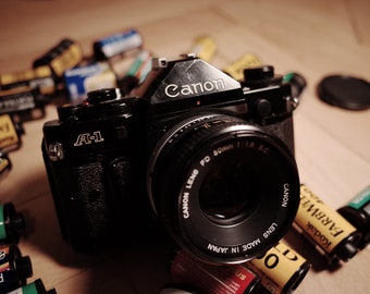 Legendary Canon A-1 Canon A1 Vintage Film SLR Camera in working, nice Condition with wide to tele zoom Working, Tested