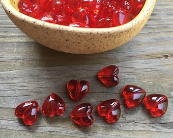 20 bright red glossy plastic hearts