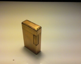 Brick Dupont Plaqet Or model 1964 good state of service. for colectioneure.
