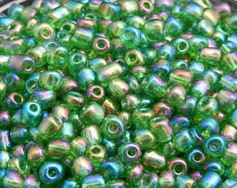 250 iridescent green seed beads