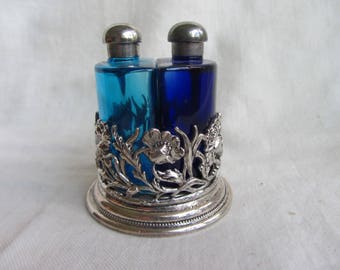 Vintage set of two cobalt blue glass perfume bottles in silver metal holder, First Impressions England. Pretty pair scent bottles in stand