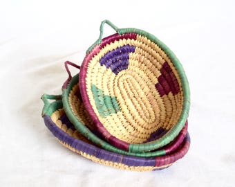 Vintage wicker baskets with hangers…wickers bowls or trays...colorful raffia baskets, bowls, trays...farmhouse chic.