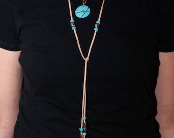 Turquoise and copper lariat style necklace.