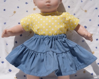 Blue skirt with a yellow blouse in a white polka dot print fits 15 inch baby dolls