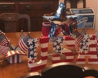 Let Freedom Ring! Stand Alone Wooden USA Letters in red white and blue