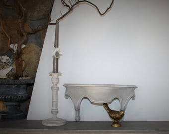 Old weathered wooden linen console