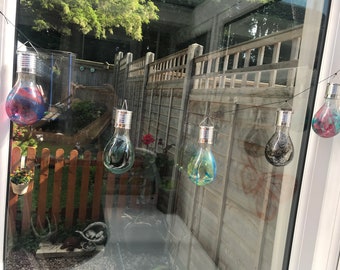 Solar powered marble string lights