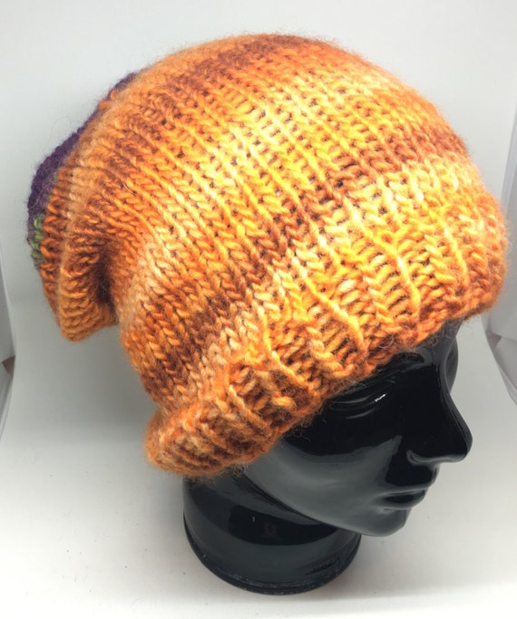 Purple and orange Medium weight slouchy handknit cozy hat. Bright fun colors. Adult size soft and loose.