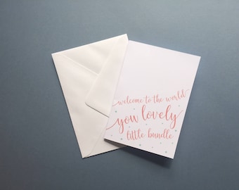 Welcome to the world you lovely little bundle new baby newborn birth card colourful print stars white A6 card with envelope