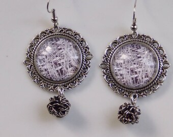 earrings... scribbles in black and white.