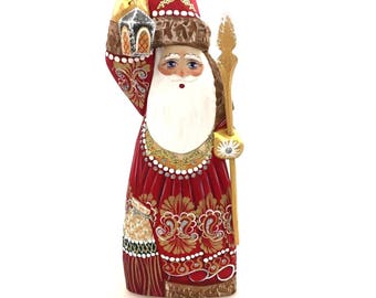 Santa Claus with flashlight, Christmas ornament, handmade and hand-painted figure, ornament for Christmas holidays and home decoration
