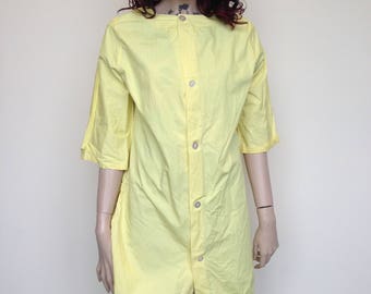 Yellow Coverall With Back Pocket for supplies!