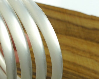 Bangle, moonglow like lucite 4 pcs