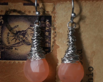 Strung-Out guitar string earrings with peach moonstone