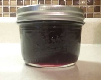 All natural 8 oz. Concord grape jelly. Home made. No GMO.