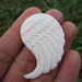 Carved bone wing Double sided , jewelry making supplies B5023