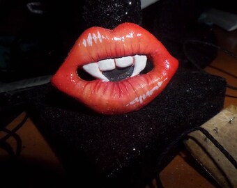 Orange Vampire Teeth Magnet