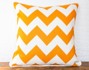Orange and ivory chevron pillow cover