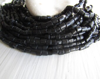 black tube bone beads, rondelle barrel spacer Bone beads, rough Irregular look, boho exotic beads 4 to 7mm long (50 beads) 7bb5-3