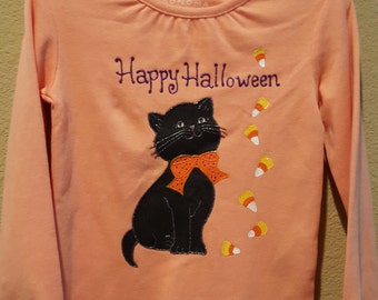 Long sleeved top featuring an adorable Halloween Cat