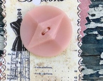 Vintage pink plastic button