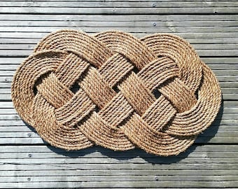 Nautical Rope Rug,Door Mat, Welcome Mat, Ocean Plait Knot. Natural Manila Rope. 690 mm (27 inches) x 430 mm (17 inches) Handmade.
