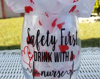 Safety first drink with a nurse, nurse gift, nurses week gifts, nurse wine glass, nursing gifts, gifts for her, wine gifts, nursing school