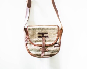 Woven and leather saddle bag