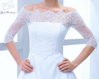 Bridal top (wedding bolero) of lace with shoulder off for a wedding dress