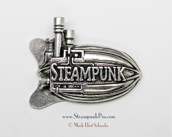 Steampunk pin, the word "Steampunk" front & center - declare your style! This Airship has 3 smoke stacks lots of detail - pewter double tac