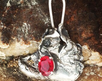 Cast silver pendant