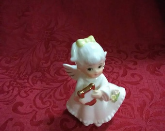 Vintage ceramic angel with harp. Made in the UK. As Coronet angel.