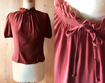 Lovely 1940s rust rayon blouse, puff sleeves