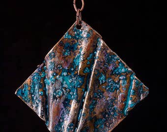 Rustic, fold formed copper pendant with blue patina