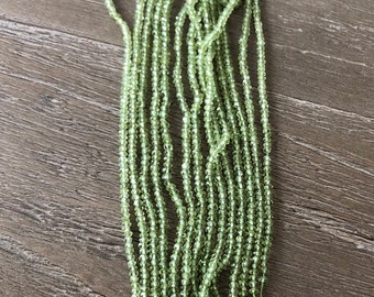 CLOSEOUT Peridot Faceted Rondelles 1 Strand