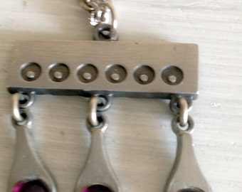 A Scandinavia/Swedish handmade necklace in tin