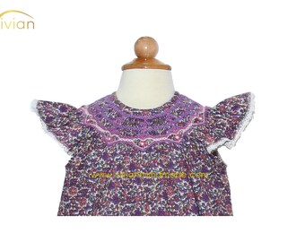 D17.90 - Hand smocked bishop dress