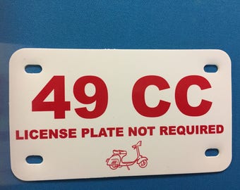 49 CC Plate white with red License Not Required
