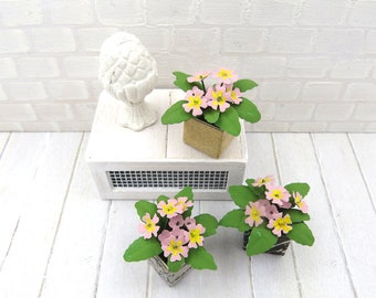 Pot of pale pink primroses for dollhouse in 1:12 scale