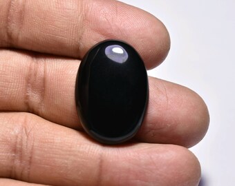 Black onyx cabochon...oval shape...30x21x6 mm...29 cts...Sr.61