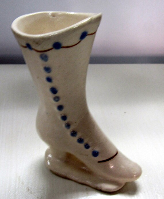 White ceramic miniature shoe