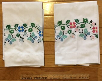 Cross-stitched floral pillowcases, set of 2